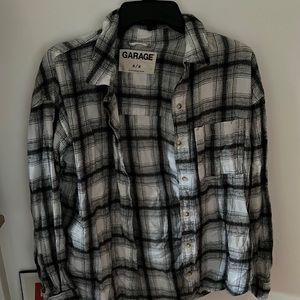 Super cute black and white flannel size medium.